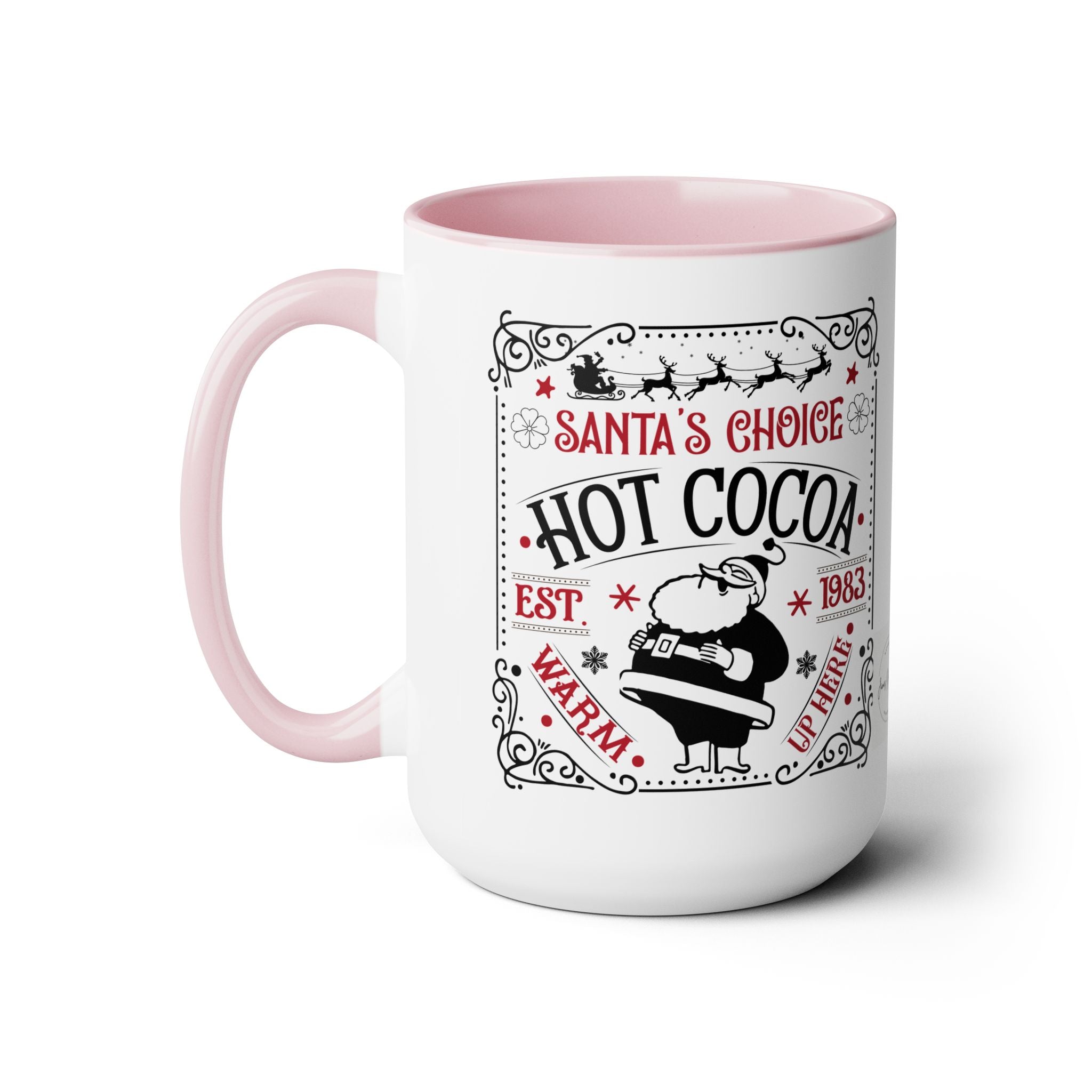 White mug with pink interior and handle, featuring a Santa-themed design.