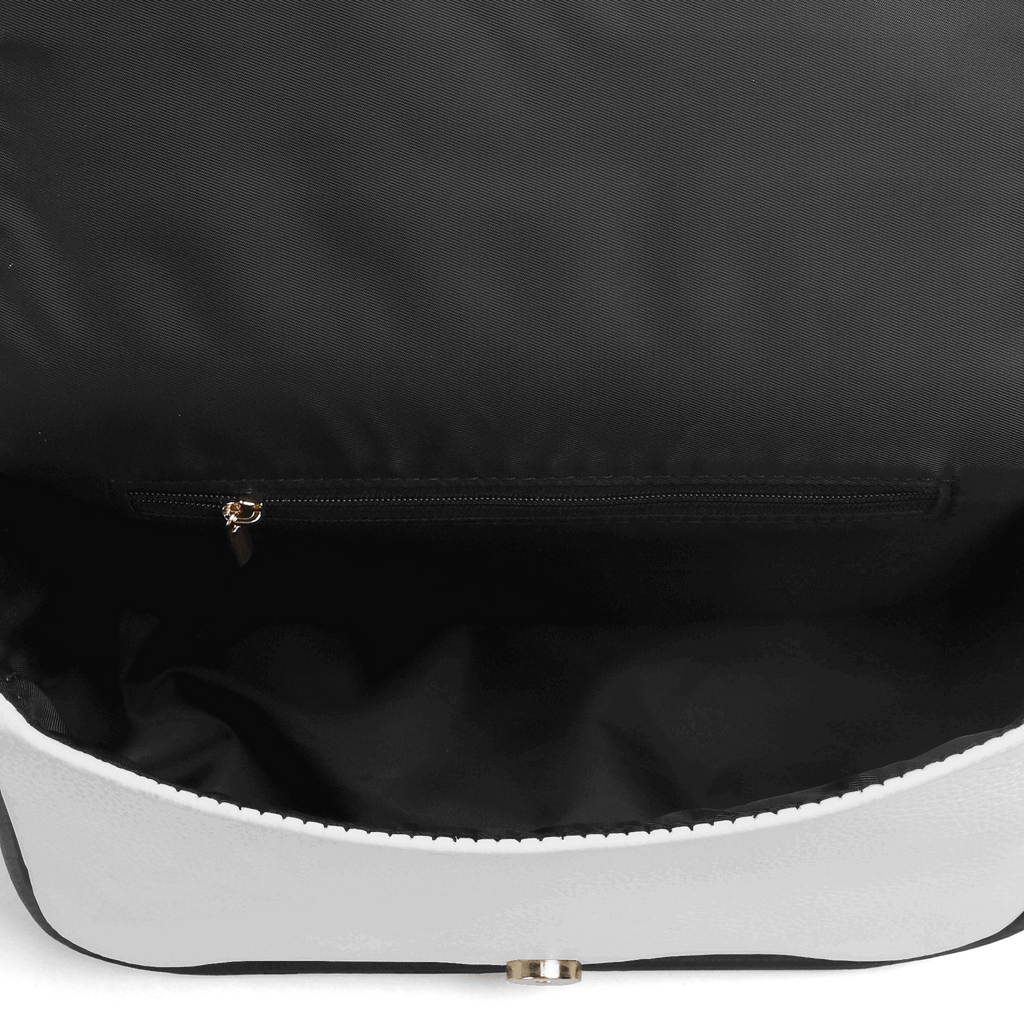 Close-up of a black handbag with a gold zipper.