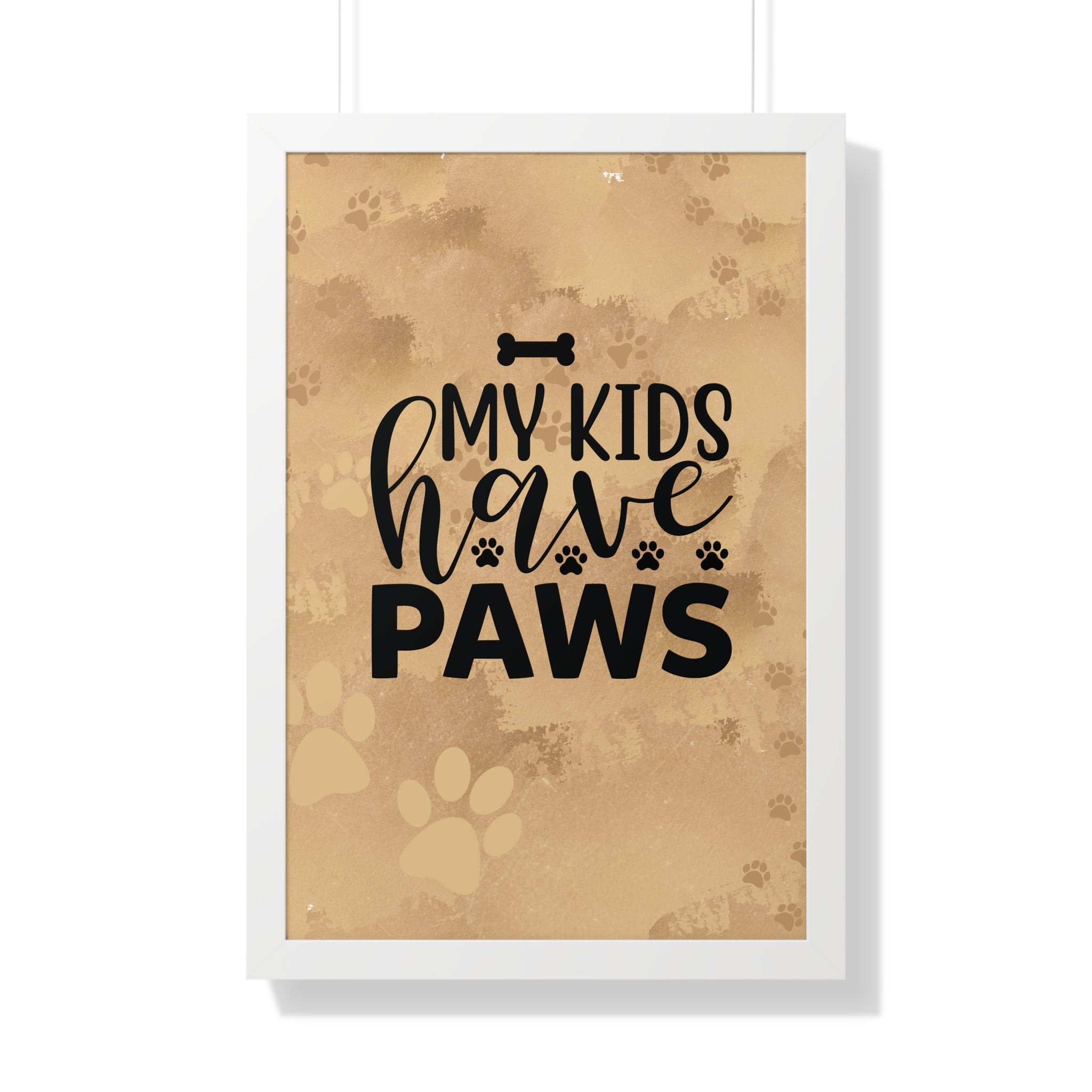 Framed poster with 'My kids have paws' text on a brown background with paw prints.