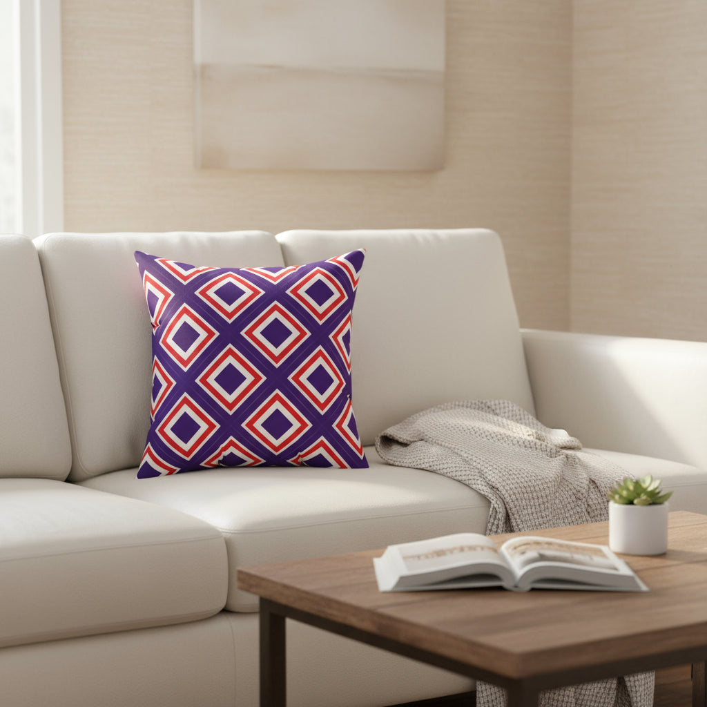 Decorative pillow with red and blue geometric pattern on a white background