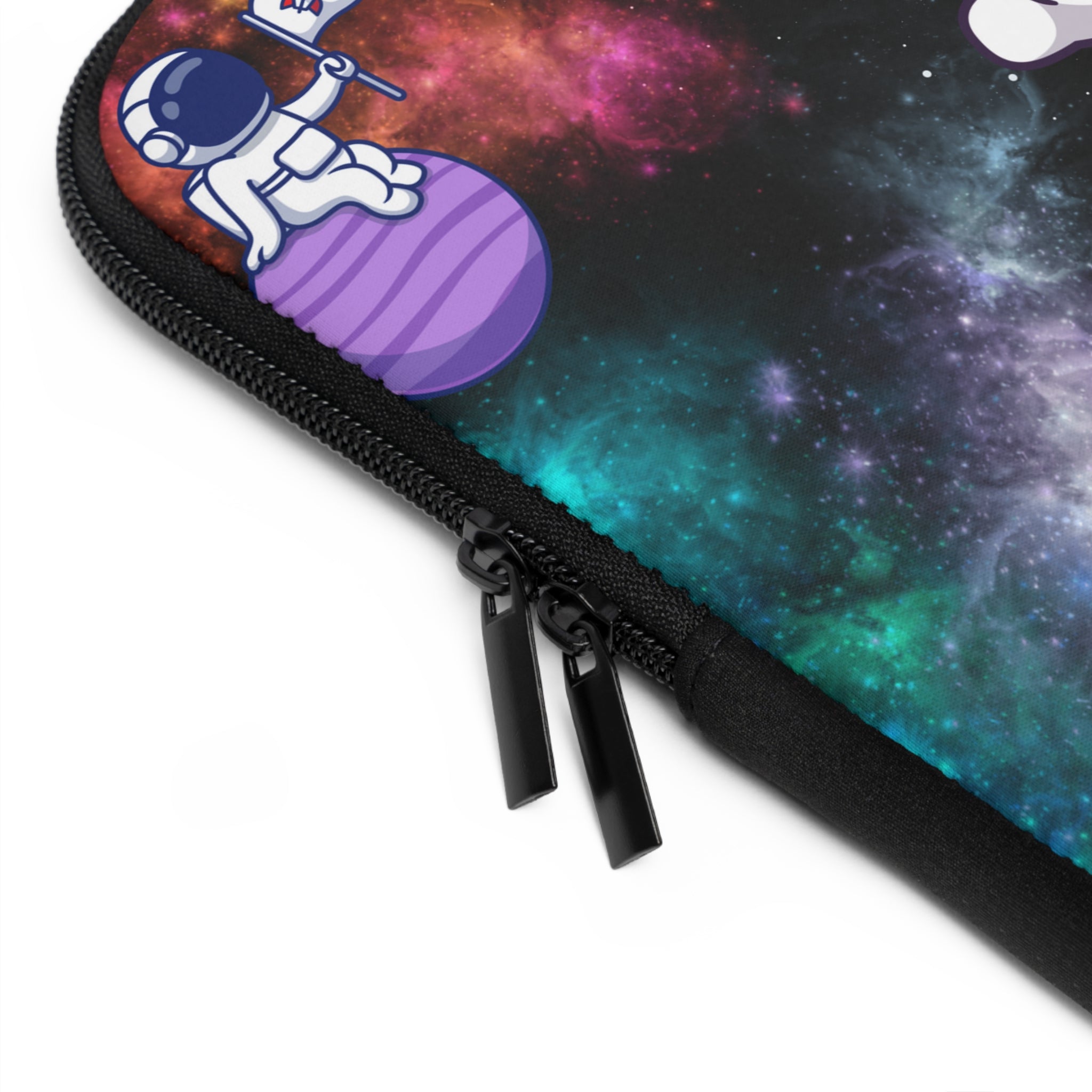 Close-up of a pouch with an astronaut design against a colorful space-themed background.