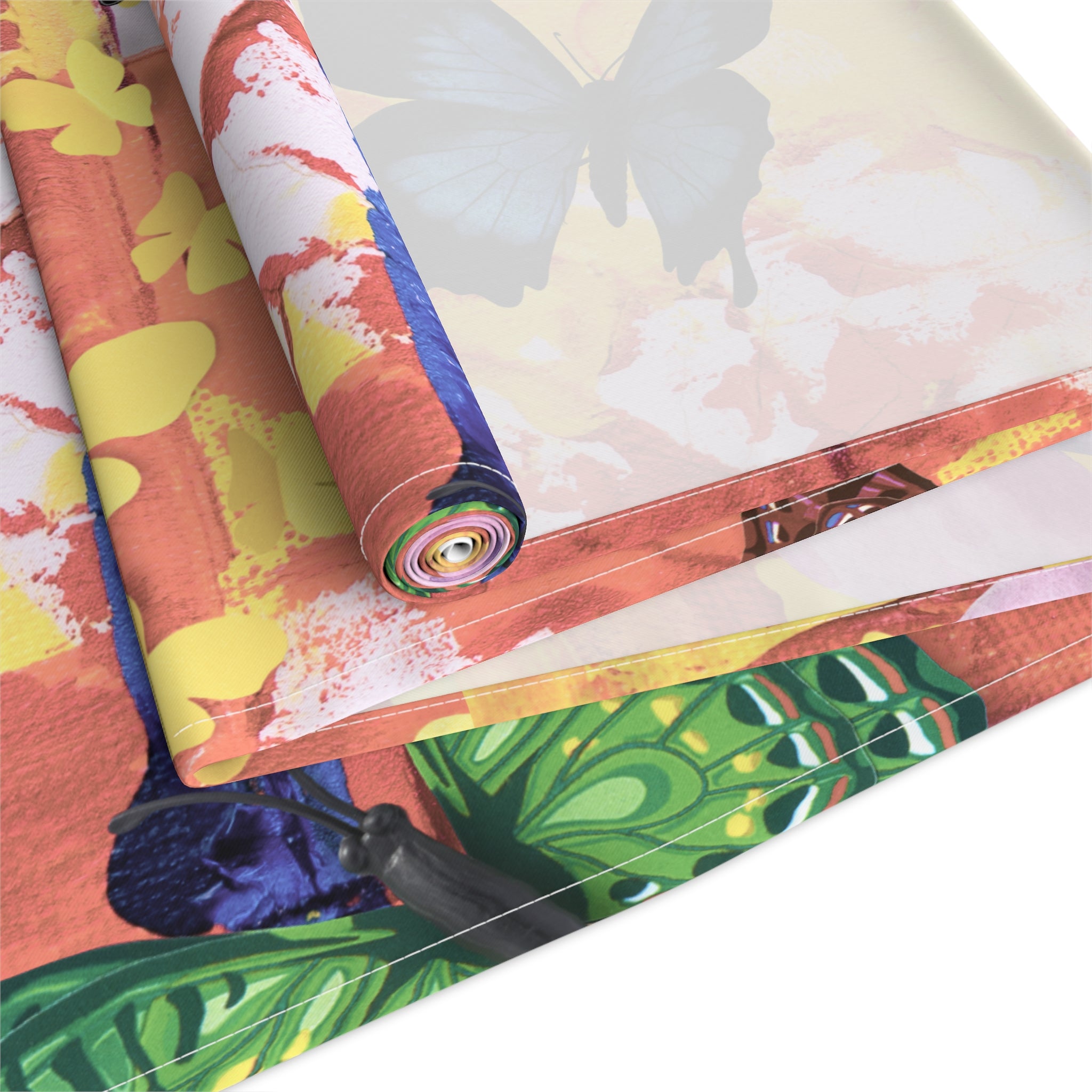 Colorful fabric swatches with butterfly and nature patterns on a white background