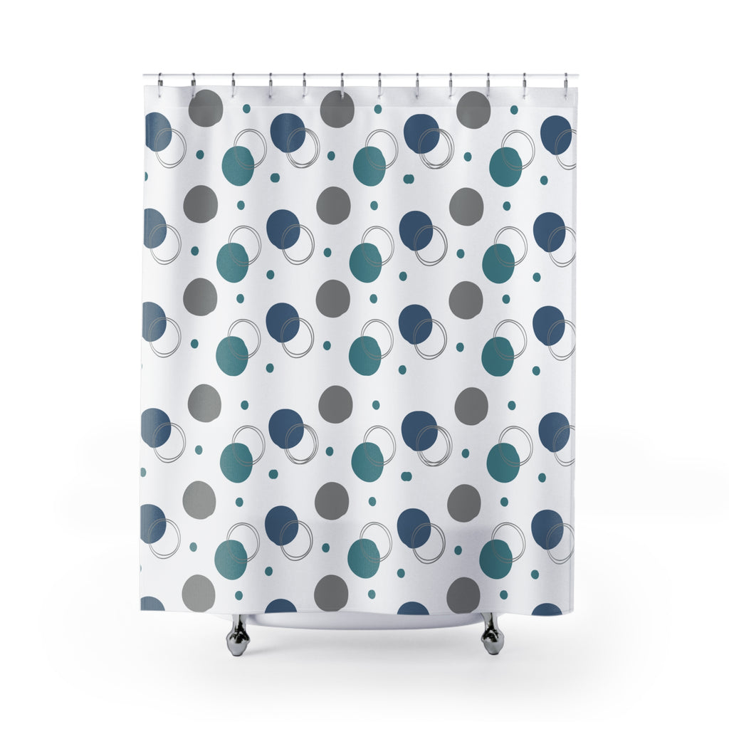 Shower curtain with blue and gray polka dot pattern on a white background