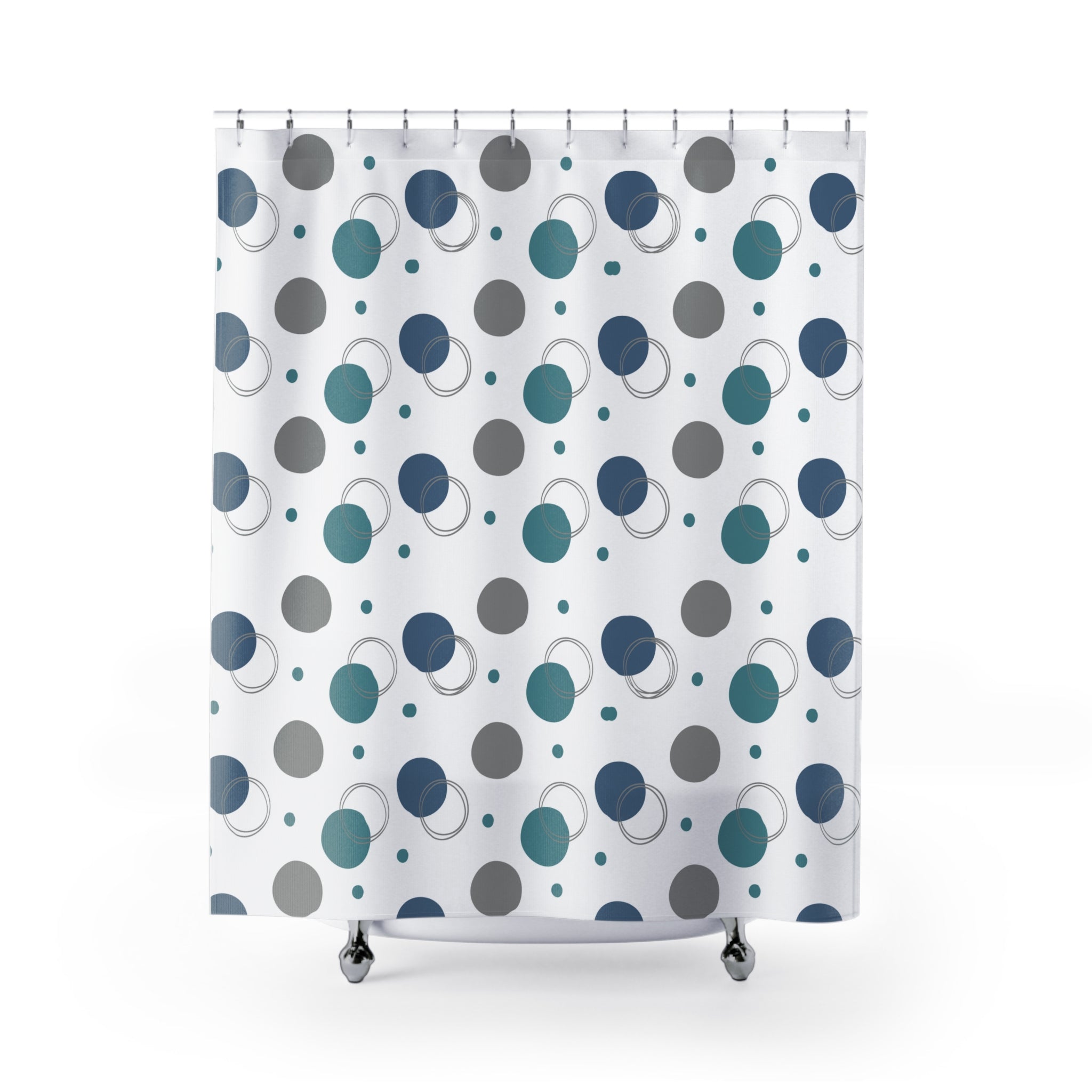 Shower curtain with blue and gray polka dot pattern on a white background
