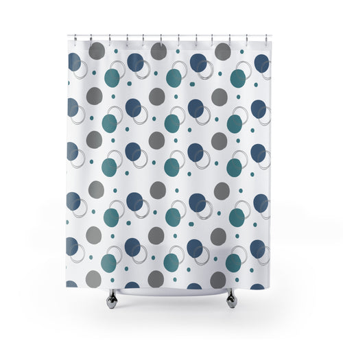 Shower curtain with blue and gray polka dot pattern on a white background