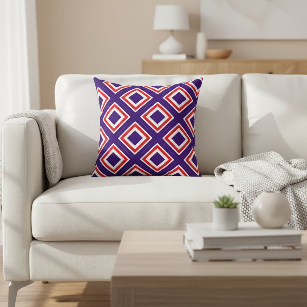Decorative pillow with red and blue geometric pattern on a white background