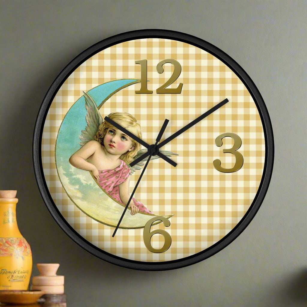 Wall clock with angel and moon design on a checkered background