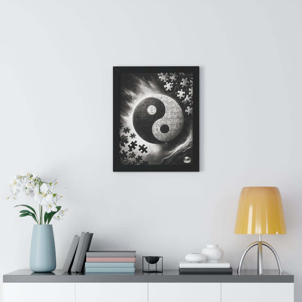 Framed artwork with a yin yang symbol and puzzle pieces on a wall above a shelf with decor items.