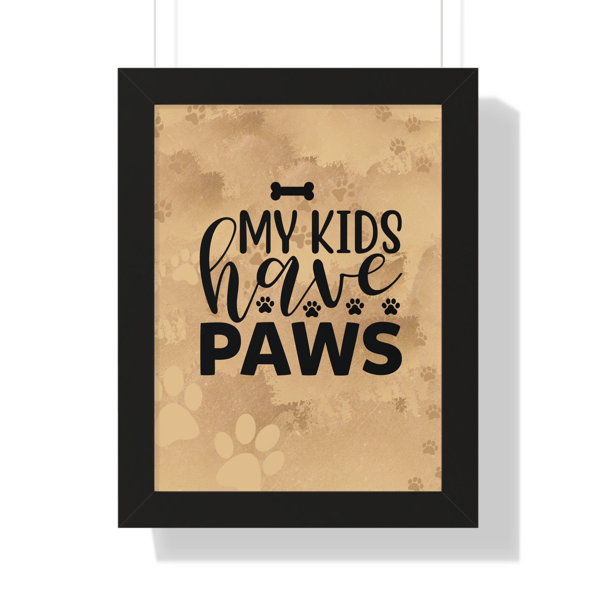 Framed poster with 'My kids have paws' text on a brown background