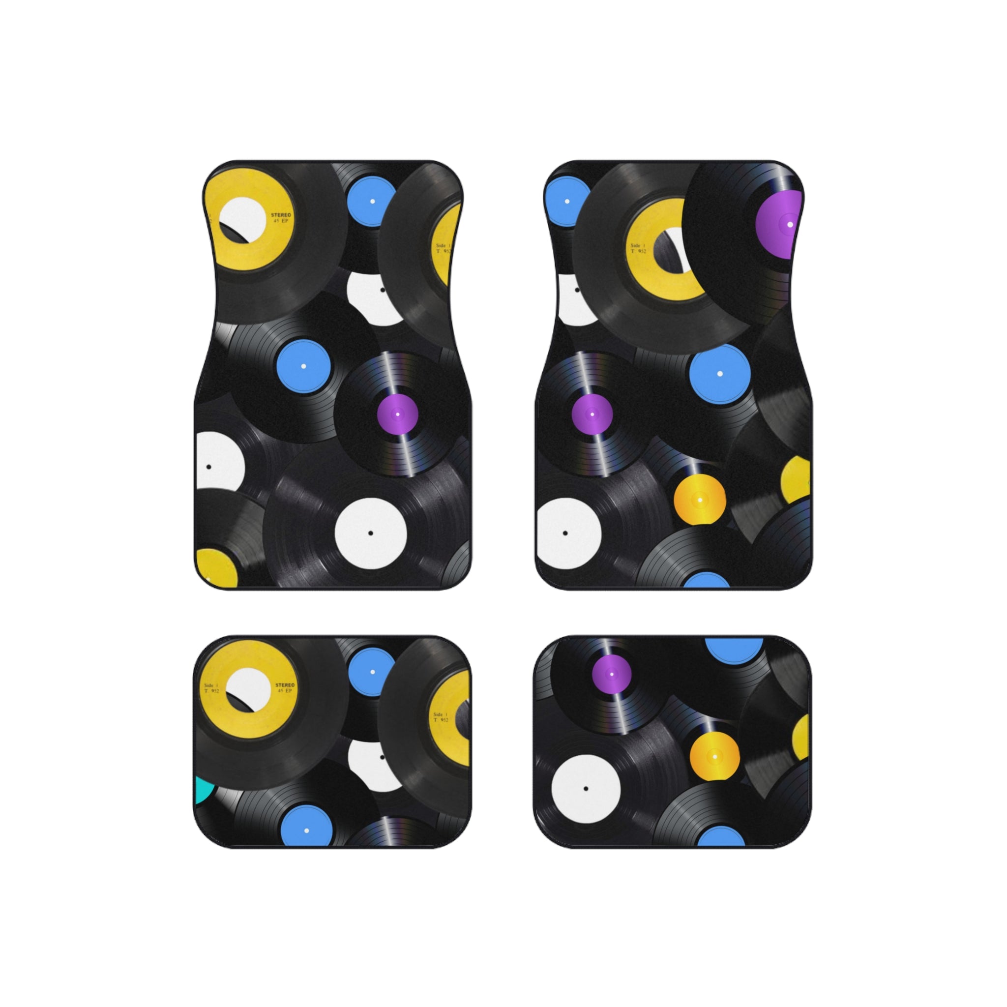 Four car floor mats with vinyl record design on a white background
