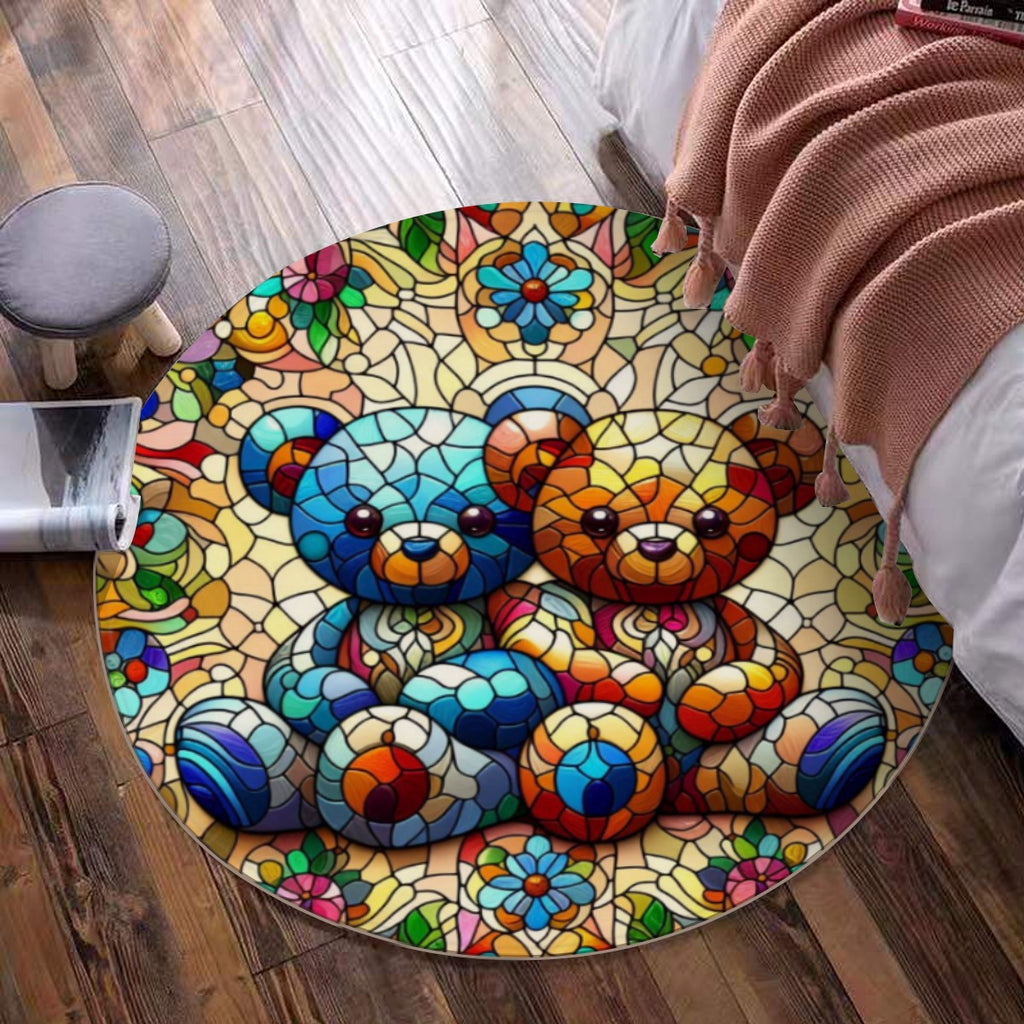 Round colorful rug with teddy bear design on a wooden floor.