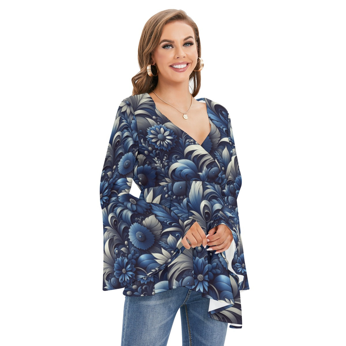 Woman wearing a blue floral long-sleeve top on a white background