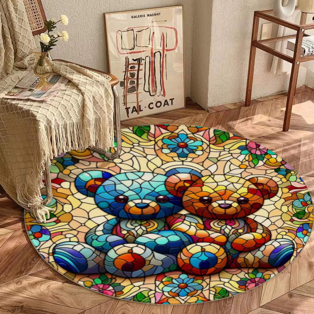 Colorful round rug with a bear design on a wooden floor.