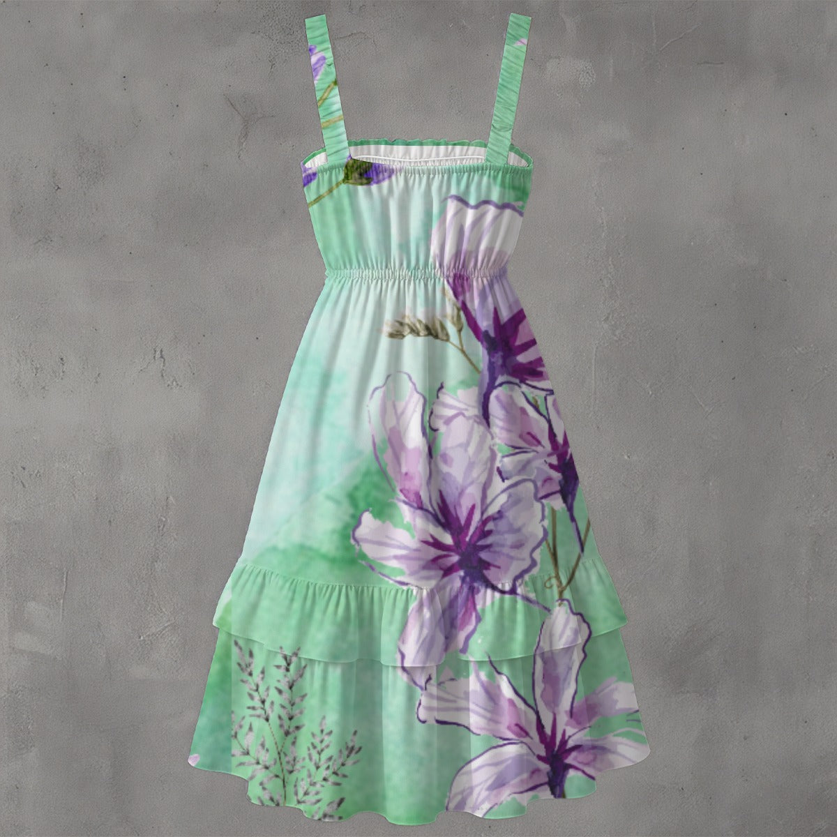Green dress with purple floral pattern on a gray background