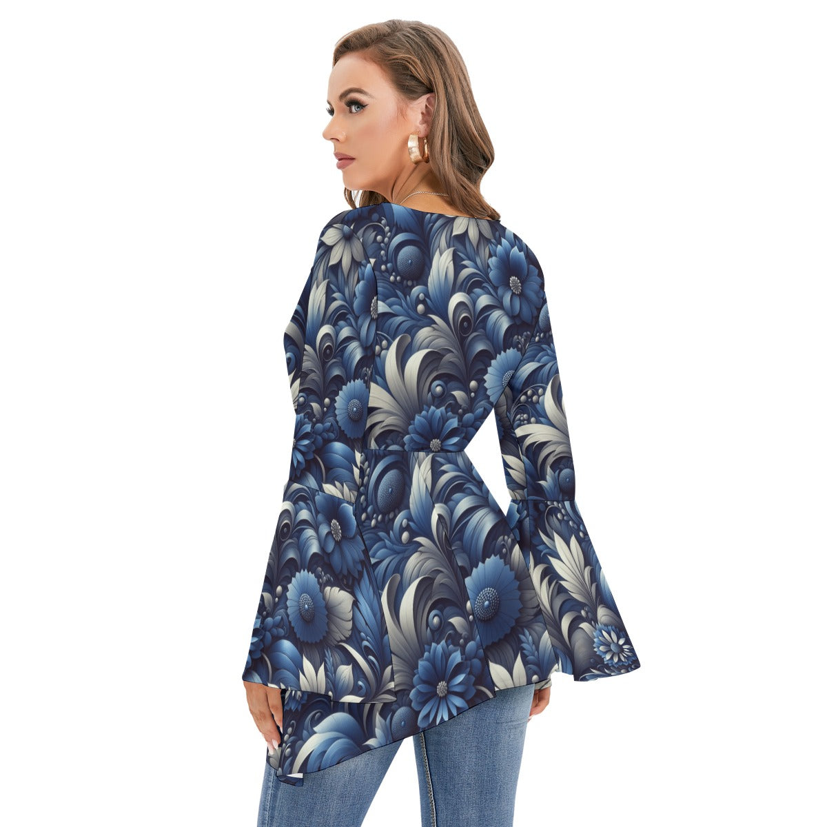 Woman wearing a blue floral long-sleeve top on a white background