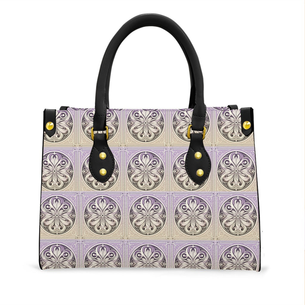 Handbag with decorative pattern and black handles on a white background