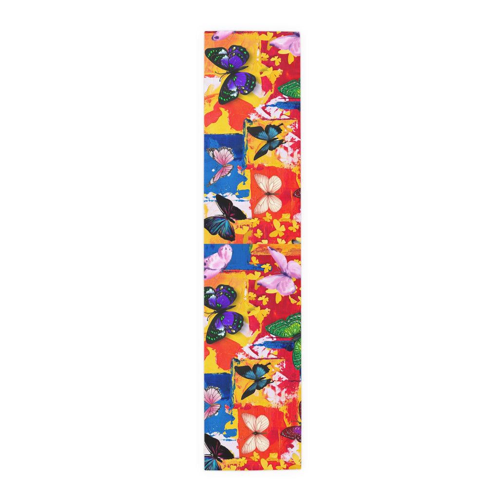Colorful skateboard deck with butterfly design on a white background