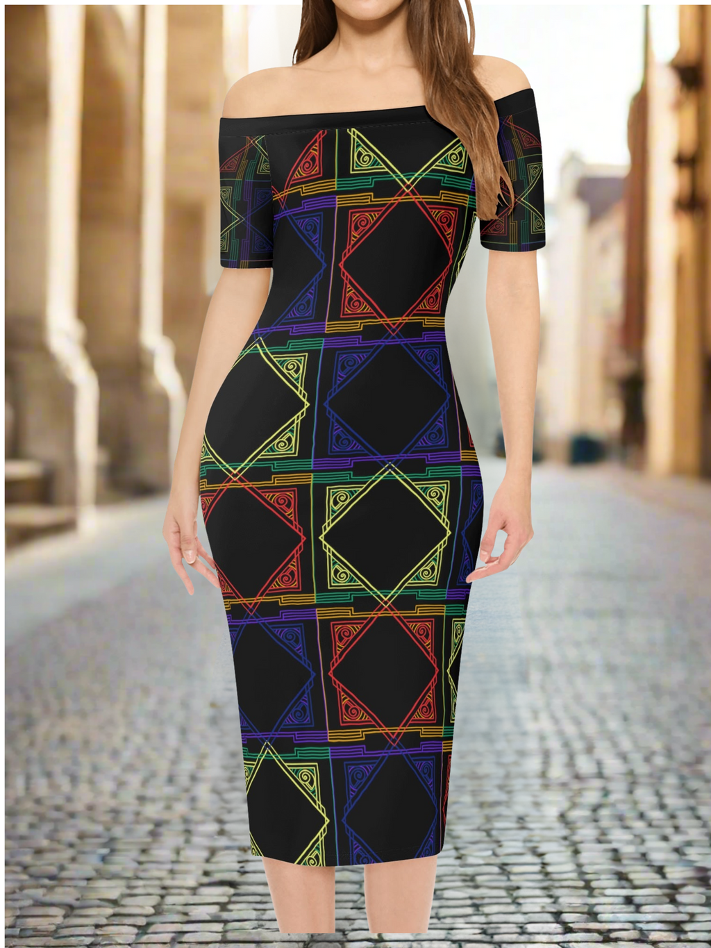 Woman wearing a colorful geometric-patterned dress on a cobblestone street.