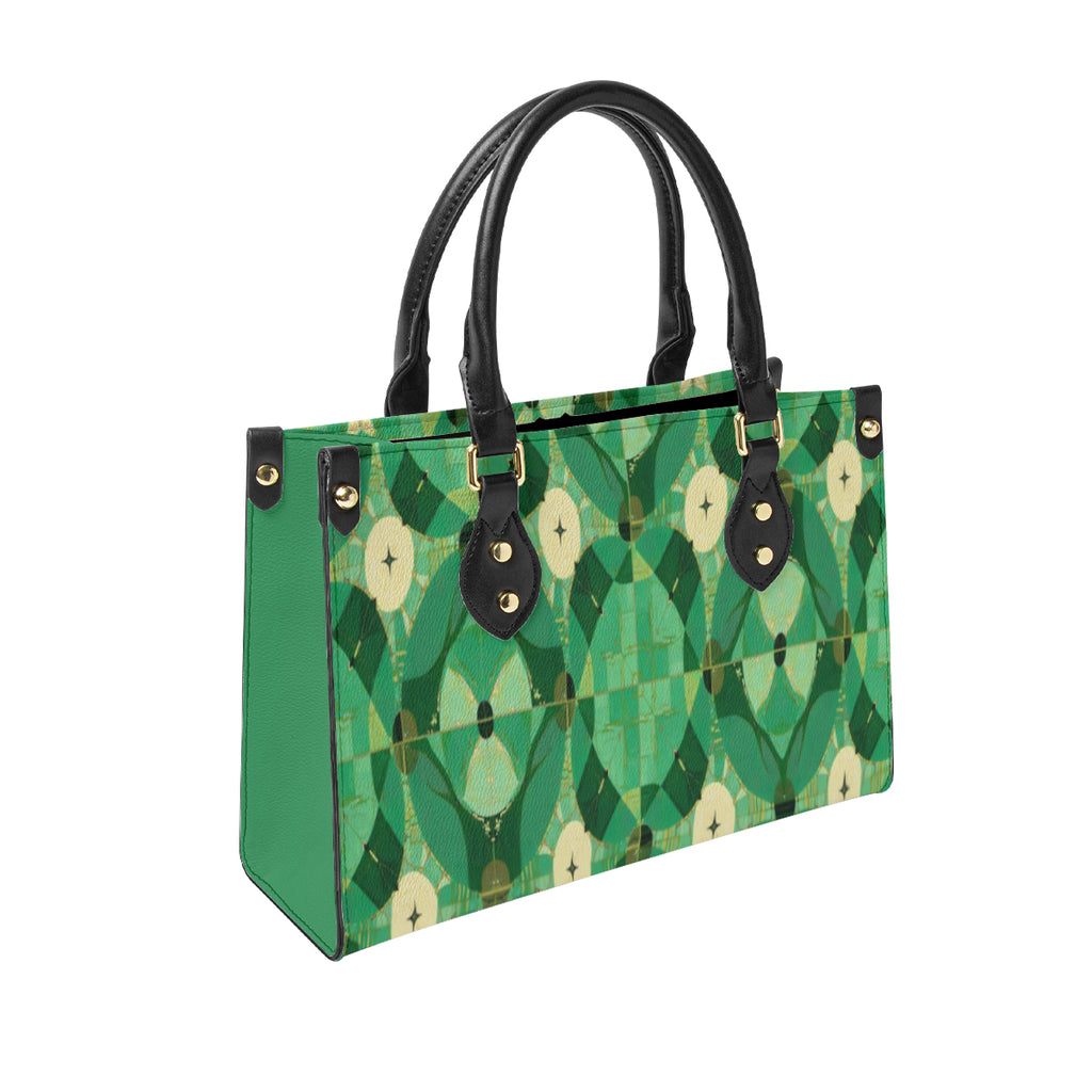 Green handbag with leaf pattern on a white background