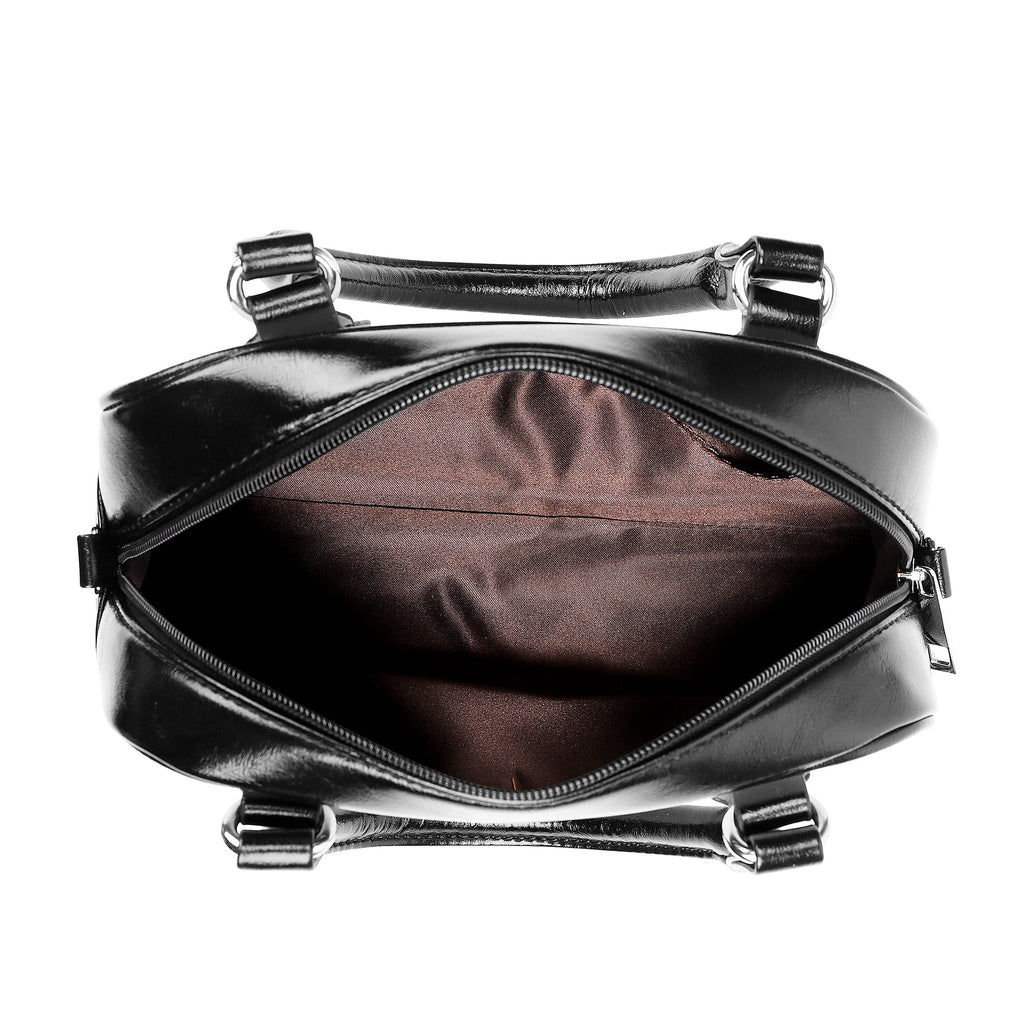 Black leather bag with silver hardware on a white background