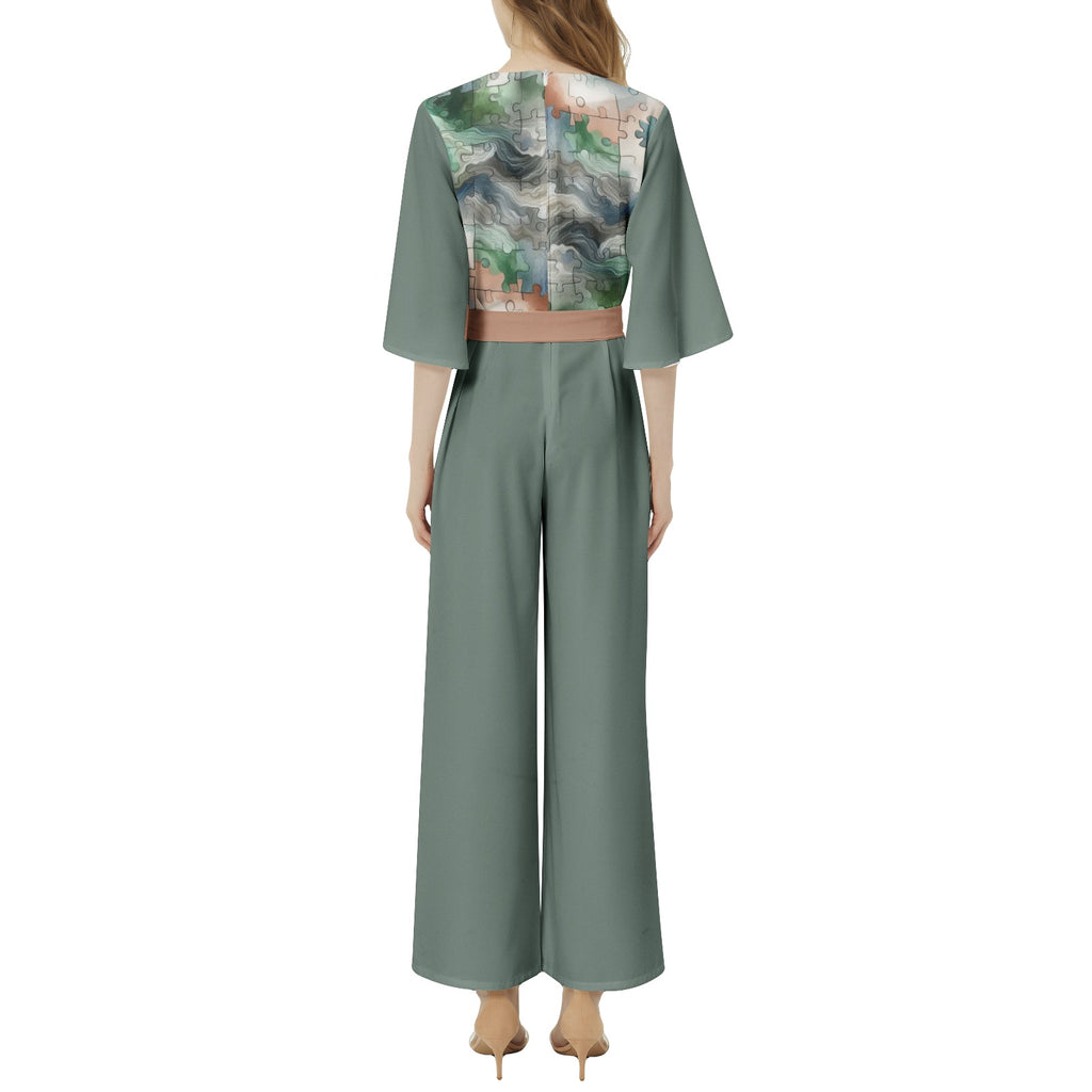 Green jumpsuit with a patterned back on a white background